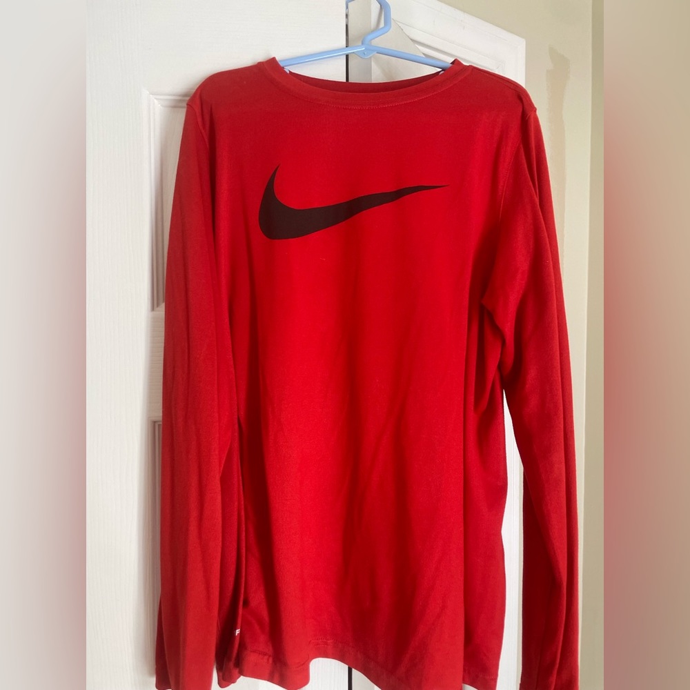 Red Nike long sleeve shirt with black swoosh
